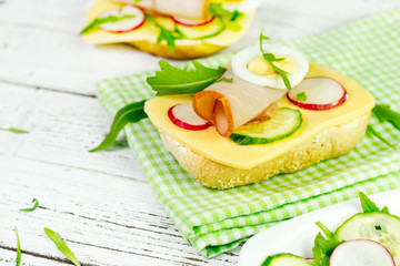 spring sandwich with curd cheese and ham.Shallow depth of field