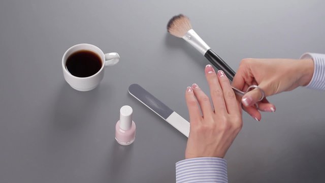 Manicure on the office table.