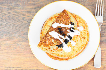 Pancakes with Black Caviar