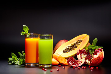 Glasses with fresh vegetable juices isolated on black. Detox 