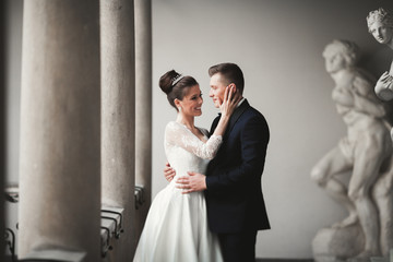 Luxury married wedding couple, bride and groom posing in old city