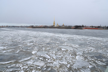 Fototapeta premium Frozen River Neva and bastion of Peter and Paul Fortress.