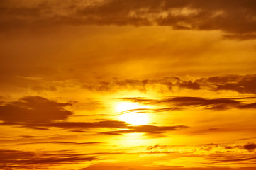 Naklejka na ściany i meble golden sunset closeup background, evening sky