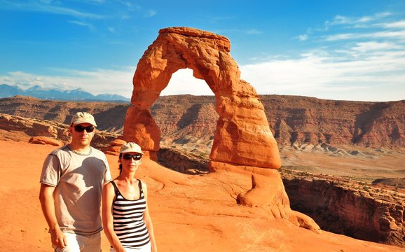 Couple in front of Delicate Arch USA