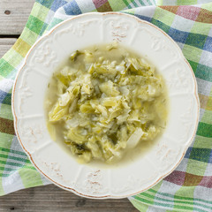 Cabbage soup on wooden table