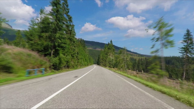 Car travel on Slovakia Tatras mountains. Fast motion.
