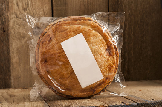 Whole Cooked Pie In Plastic Packaging