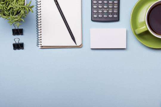 Office Table With Supply And Coffe Cup. View From Above. Copy Space For Text