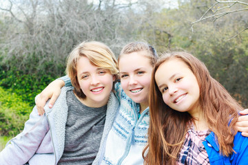 Fototapeta premium Three Girls Sitting together
