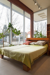Bedroom interior with wooden master bed