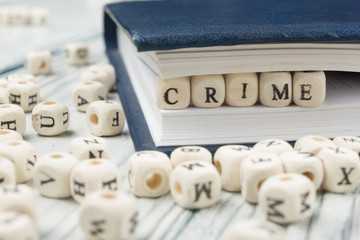 Crime word written on wood block. Wooden ABC