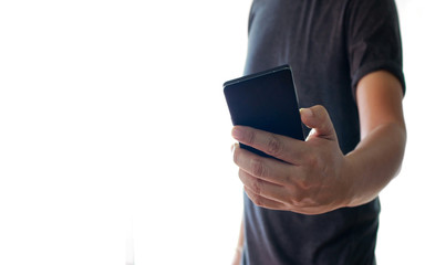 a man using hand holding the smartphone