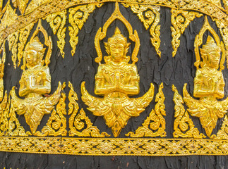 Plastic gold pattern on tree in the temple, Thailand
