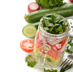 Fresh vegetable salad in Mason jar