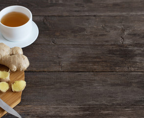 Cup of Ginger tea on dark blue background
