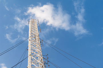 antenna repeater tower on blue sky