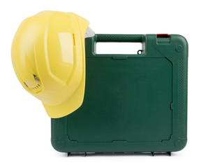Closed tool box with construction yellow helmet