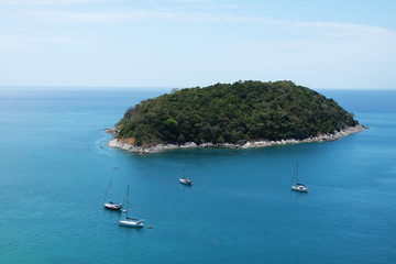 white yacht floating in the ocean - Phuket, Thailand