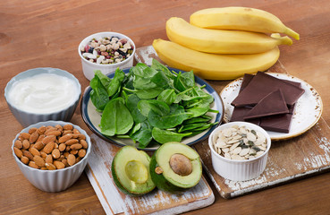 Foods High in Magnesium on a wooden table.
