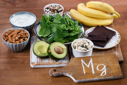 Foods High in Magnesium on  wooden table.