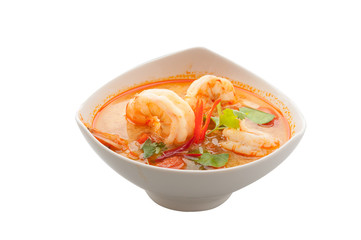 Tom Yum Kong in white bowl, Thai hot and spicy food