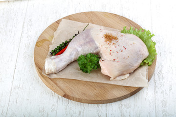 Raw chicken leg