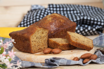 Homemade banana bread sliced on a table . rustic style