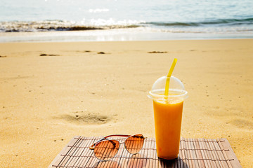  tropical cocktail with glasses  on the beach.