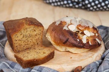 Homemade banana bread sliced on a table . rustic style