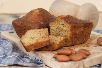 Homemade banana bread sliced on a table . rustic style