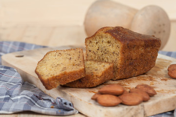 Homemade banana bread sliced on a table . rustic style