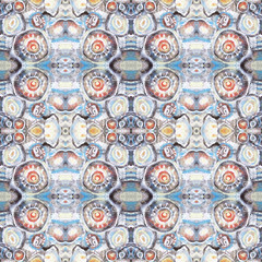 Seamless pattern. Abstract painted background with orange,brown and blue water blots. Kaleidoscopic seamless pattern.