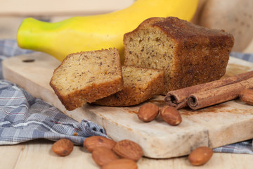Homemade banana bread sliced on a table . rustic style