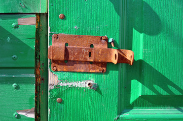 the main thing is safety - door with a rusty bolt