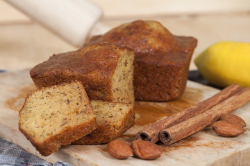 Homemade banana bread sliced on a table . rustic style