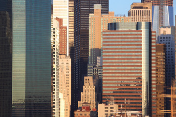 Fototapeta na wymiar Manhattan Skyscrapers: The Stone Jungle of New York