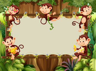 Fototapeta premium Frame design with monkeys in the woods