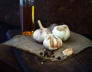 heads of garlic on a wooden background