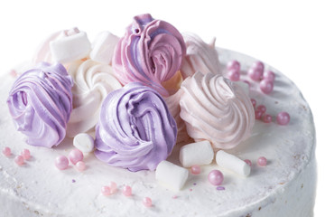 cake with white cream and marshmallows, isolated on a light back