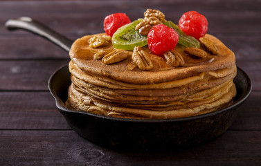 Crepes with nuts and candied fruits