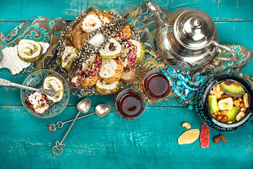 Tea and turkish delight on wooden background