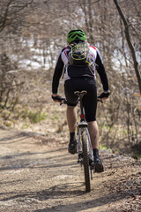Fototapeta na wymiar Cyclist riding mountain bike
