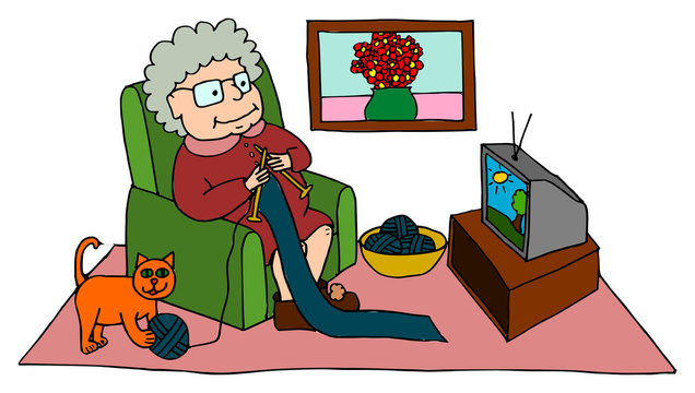 Cute grandma knitting while sitting on armchair