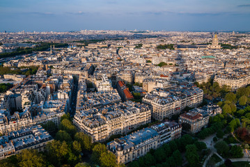 Skyline of Paris, France. A view from the top of Eiffel tower at sunset