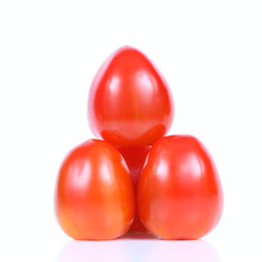 Ripe cherry tomatoes isolated on white