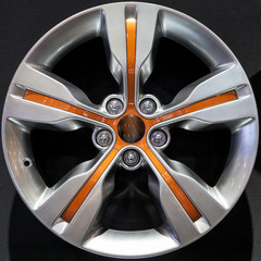  Car alloy rim on black background