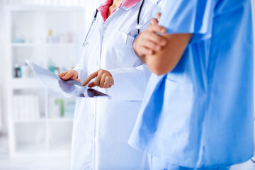 Doctor is point to x-ray picture