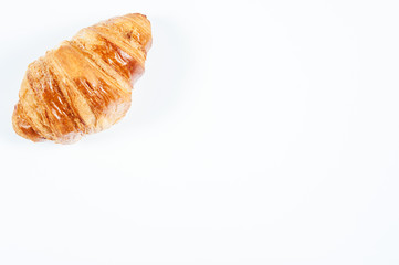 croissant / fresh delicious croissant lying on a table ready to eat
