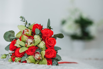Beautiful bouquet of red roses for celebration and wedding.