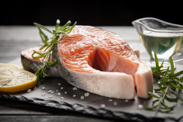 Fresh salmon on old wood